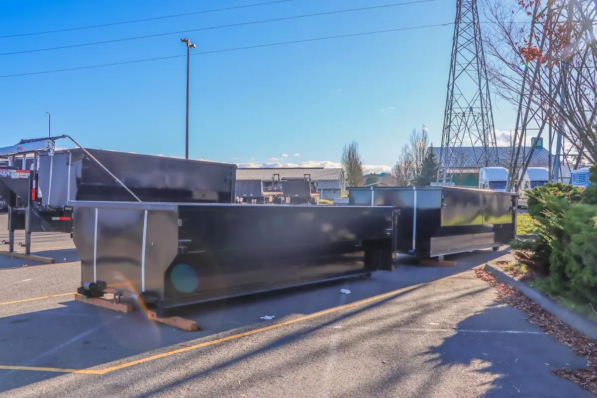 Roll-off dumpster ready for waste disposal at job site for 3 Yard Dumpster Rental in Cartersville